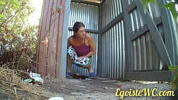 Watching the pissing of a village young lady in an antediluvian toilet. video