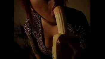 Horny bitch with big lips suck a banana video